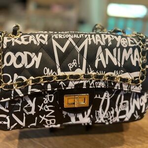 Brand new Chic Black and White Graffiti Shoulder Bag or Crossbody.